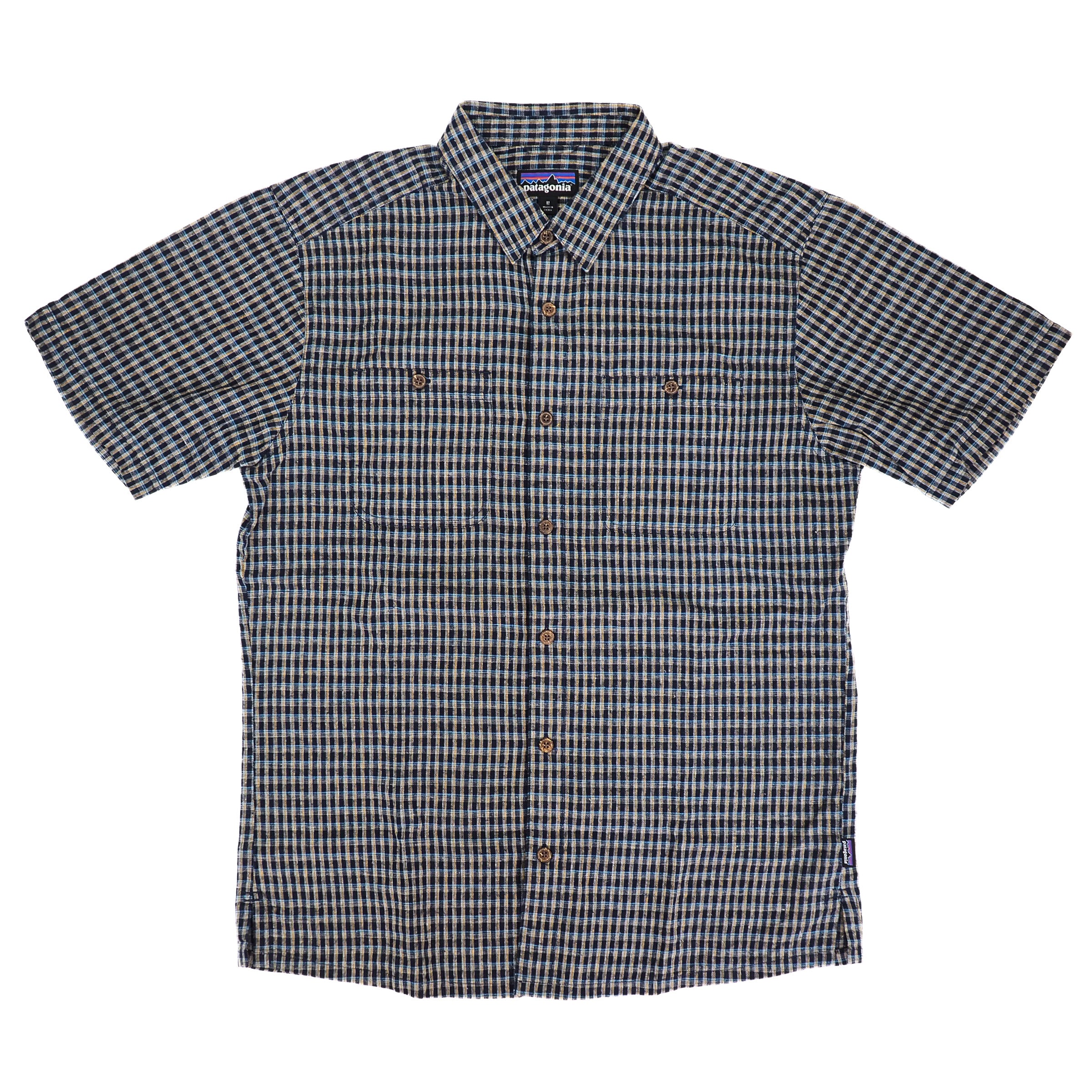 Checkered shirt with Patagonia brand logo on a white background