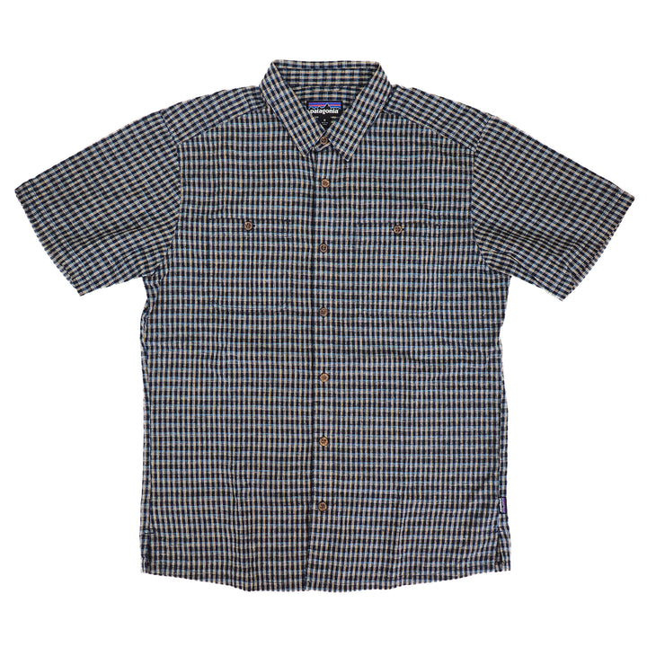 Checkered shirt with Patagonia brand logo on a white background
