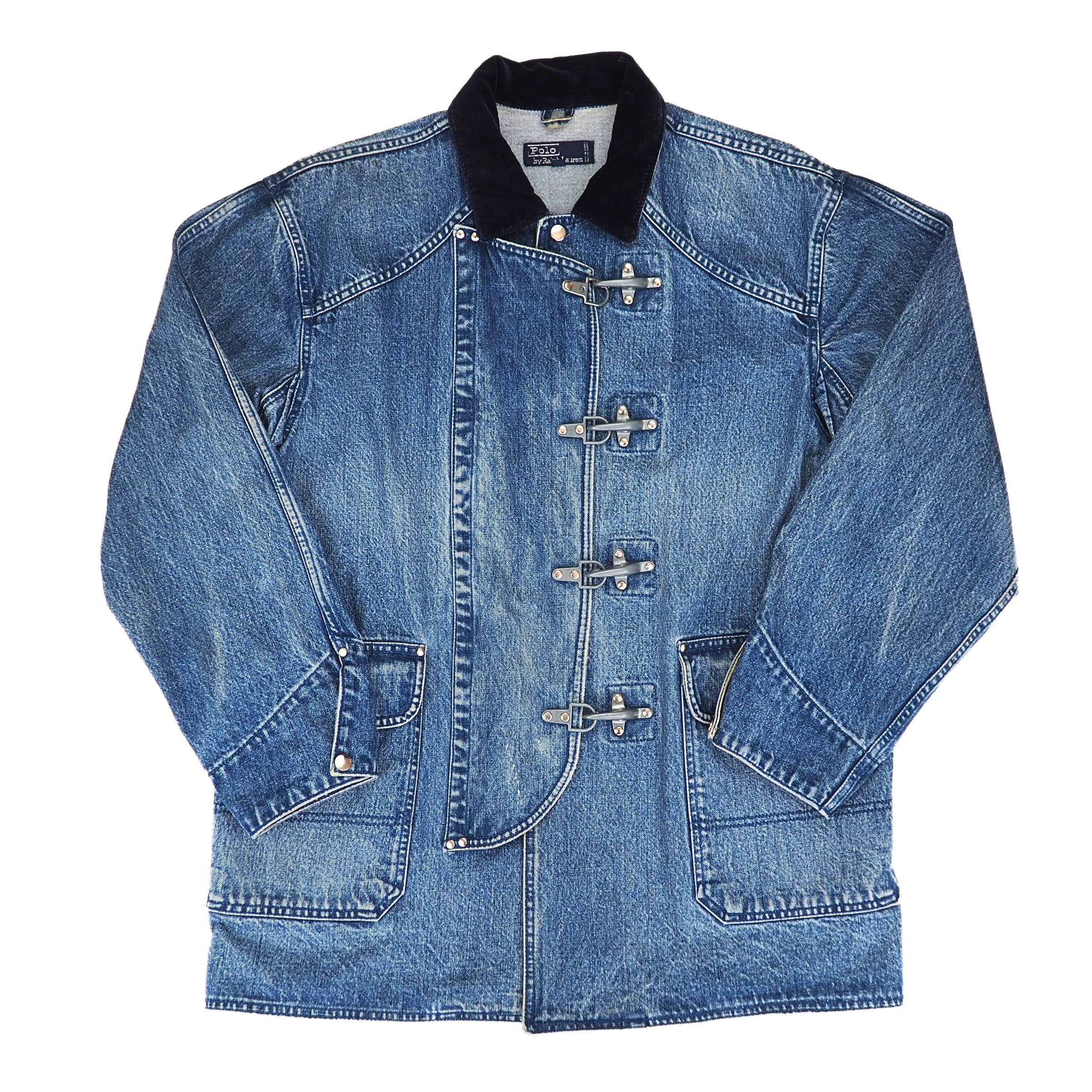 A blue denim jacket with a black collar and decorative toggle closures, laid flat against a white background.