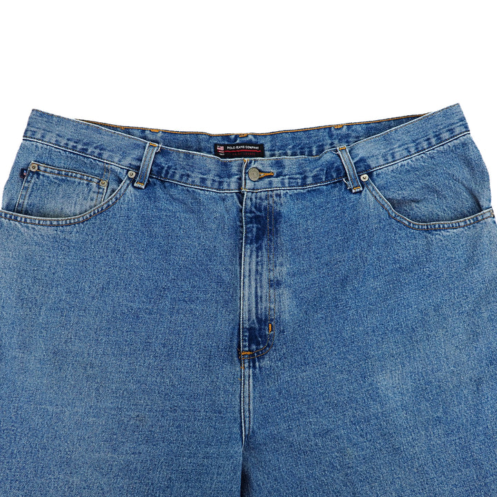 Blue jeans with a Ralph Lauren brand label on a white background
