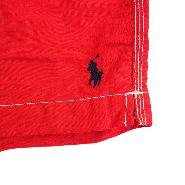 Red Ralph Lauren Polo shorts with a black pony logo on a white background