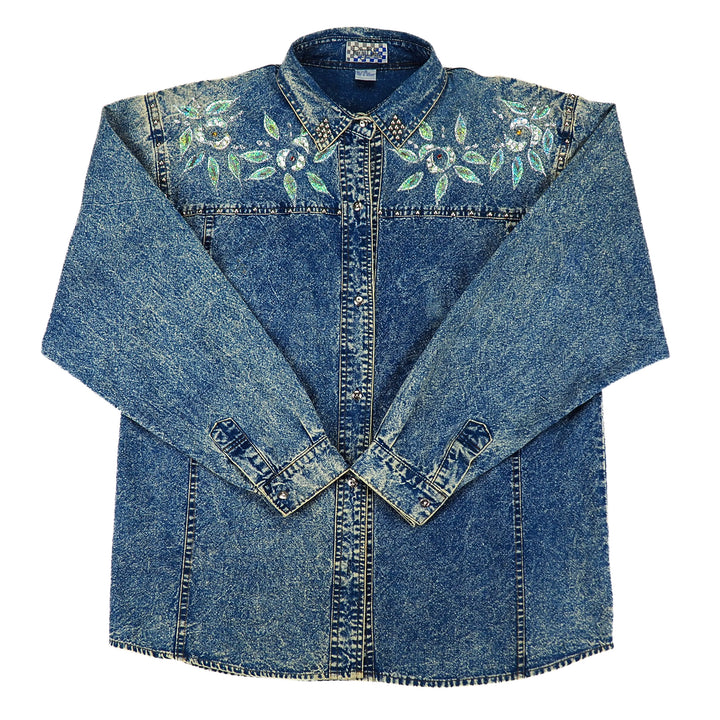 Front view Pretty Bleu 90s acid wash Blue western style denim shirt with floral embroidery and beading on a white background