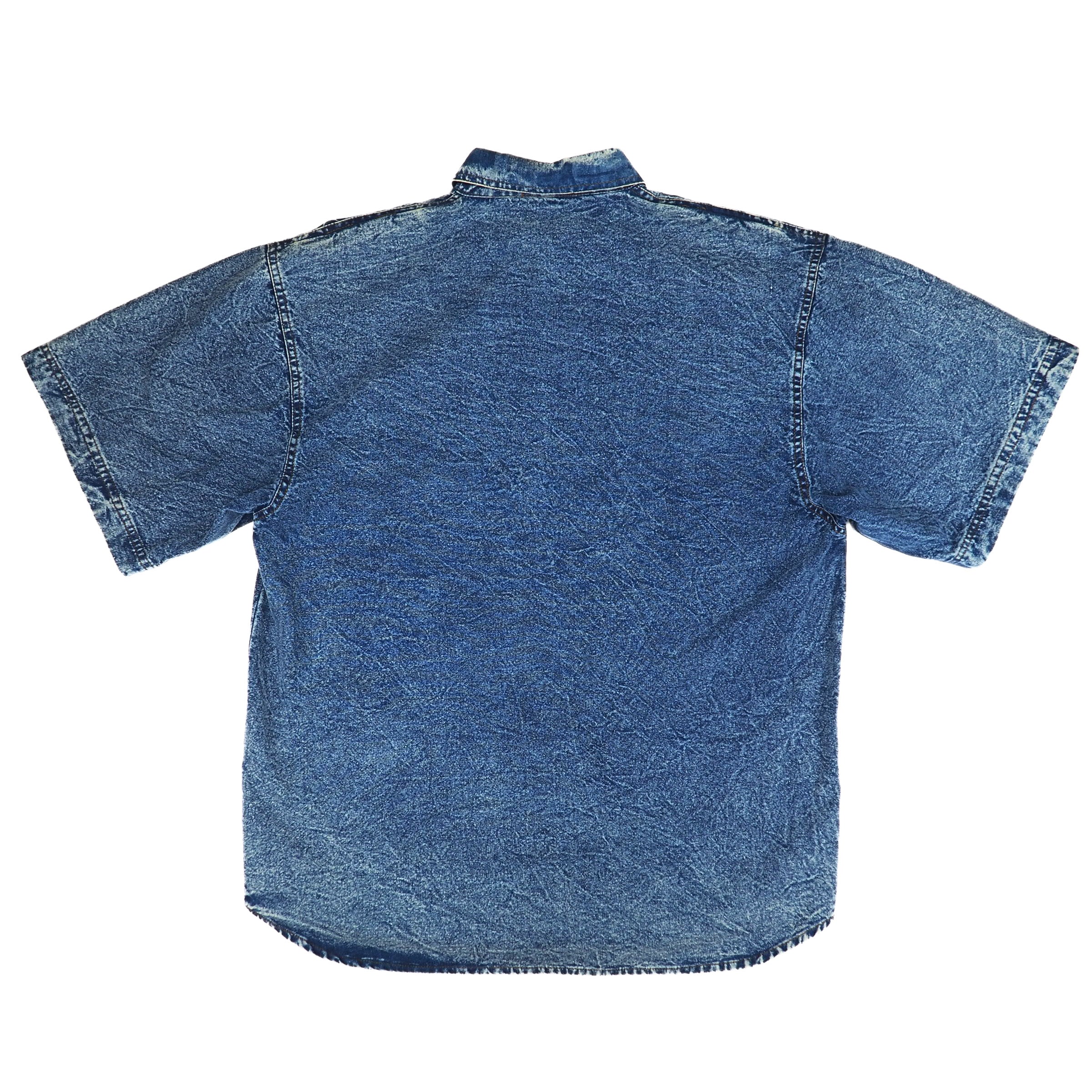 Back view of a blue denim short sleeved shirt on a white background