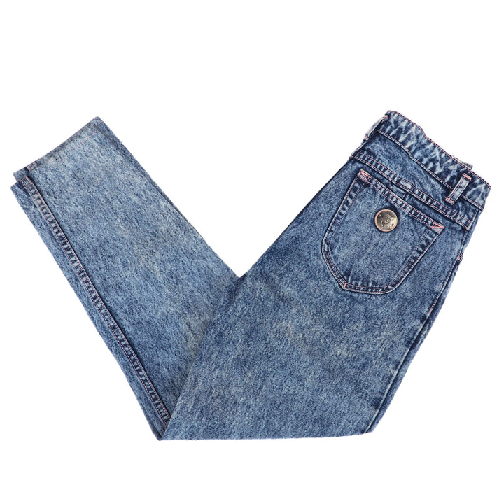 Blue jeans folded on a white background