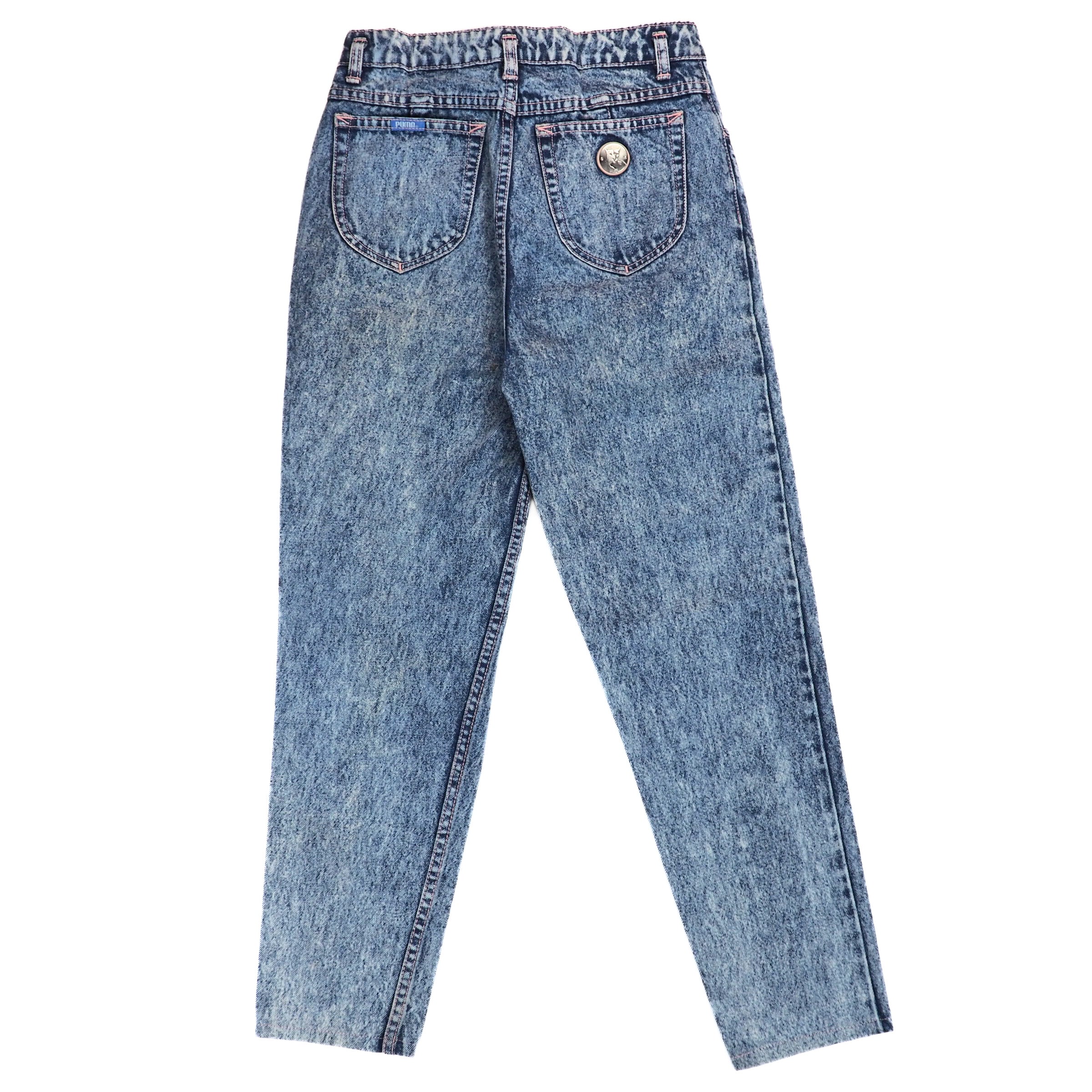 Bakc view of a pair of blue acid wash jeans on a white background