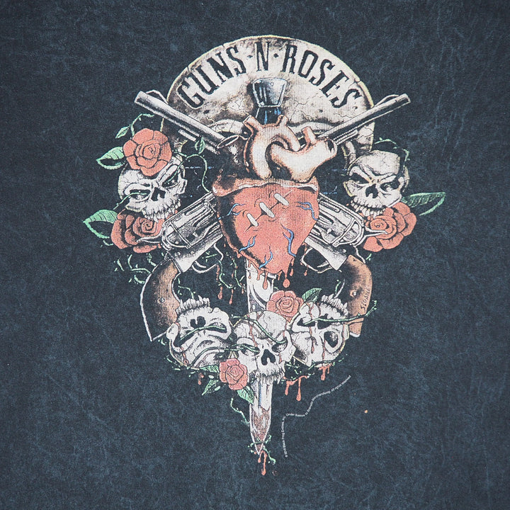 Detail of a 'Guns N Roses' graphic logo on a black t-shirt