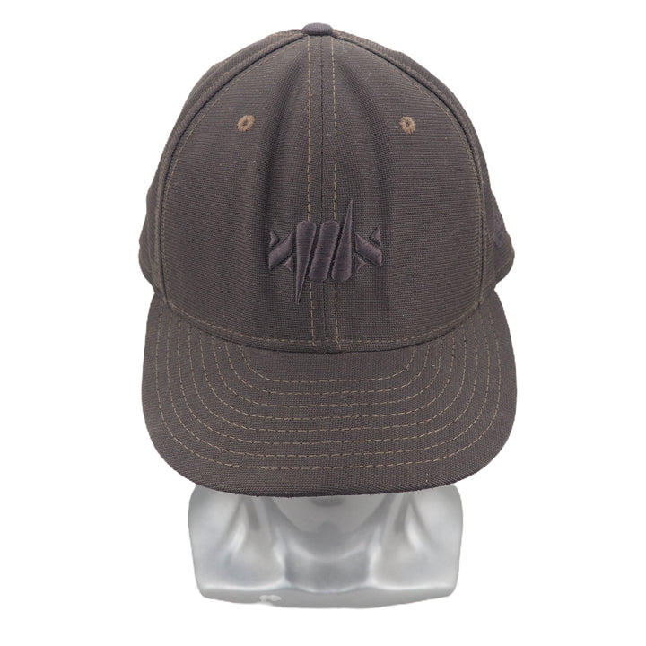 Brown baseball cap on a mannequin head with a logo on the back against a white background