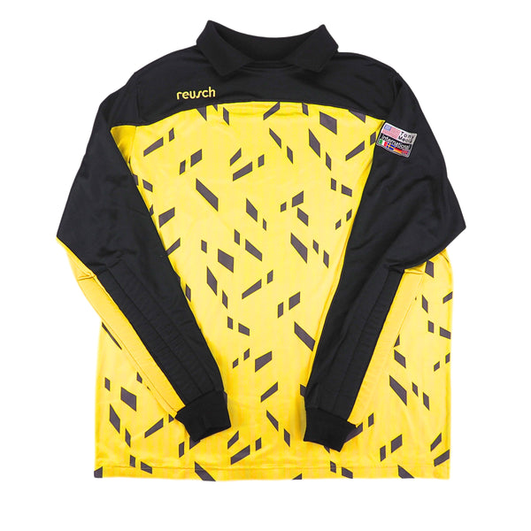 Black and yellow sports jersey with 'reusch' branding on a white background