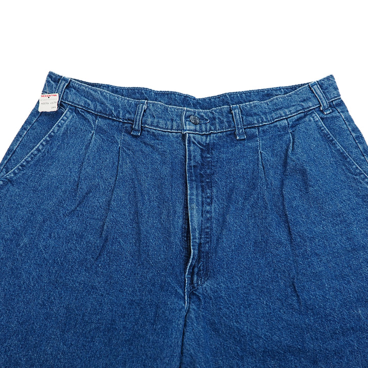 Blue denim jean pants on a white background