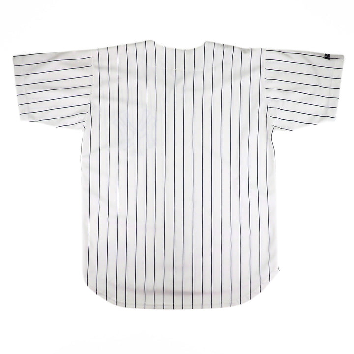 Reverse of a white and navy striped NY Yankees baseball jersey on a white background