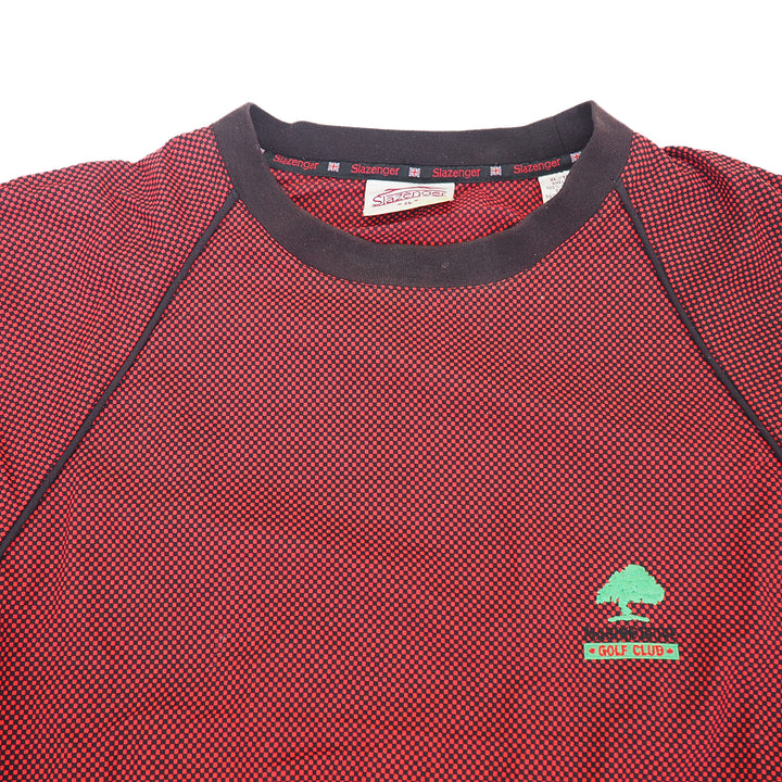 Red textured shirt with a logo on a white background