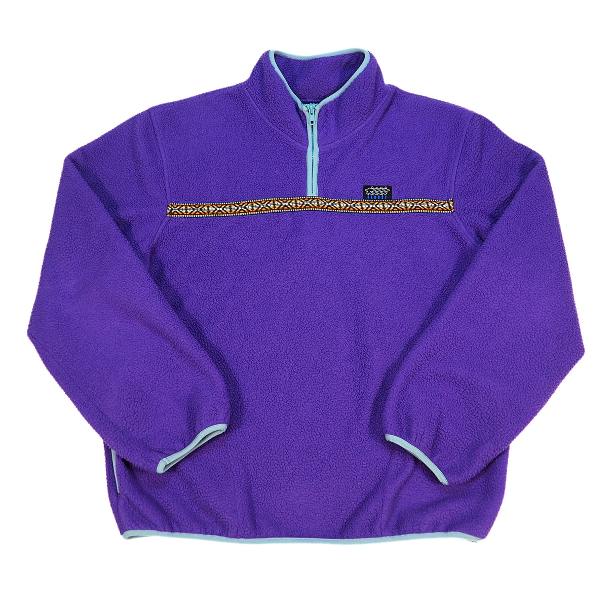 A purple fleece quarter-zip pullover jacket with a light blue zipper, light blue trim, and a decorative horizontal patterned stripe across the chest. A small black Stussy logo is visible on the chest.