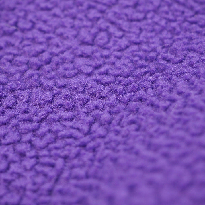 Close up of purple fleece fabric.