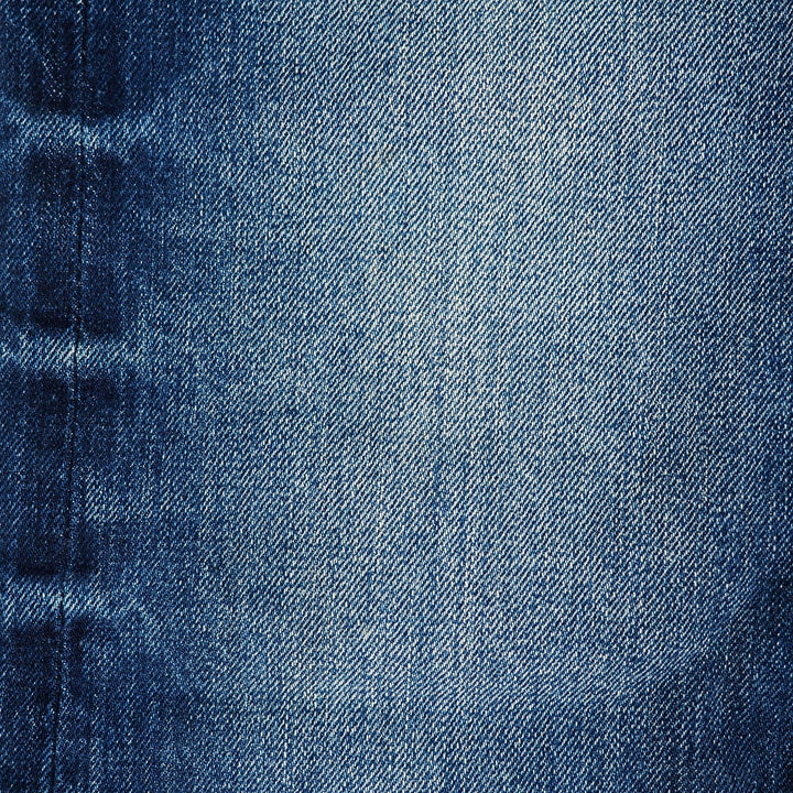 Close-up of blue denim fabric texture