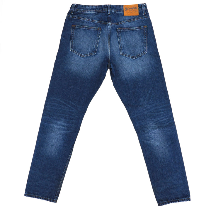 The Stronghold relaxed tapered japanese selvedge blue denim jeans on a white background