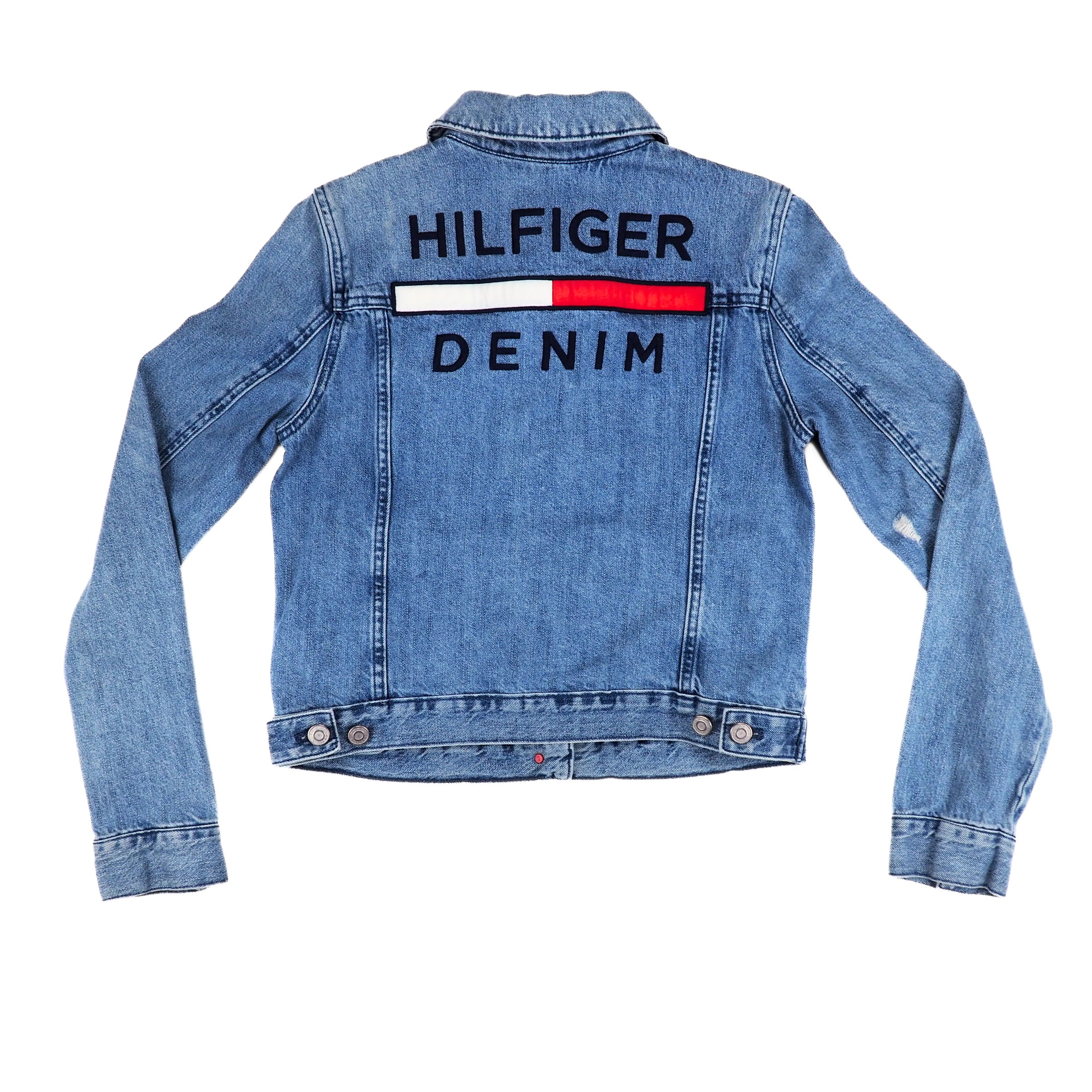 Back view of a light blue denim jacket with embroidered 'Tommy Hilfiger Denim' branding on a white background