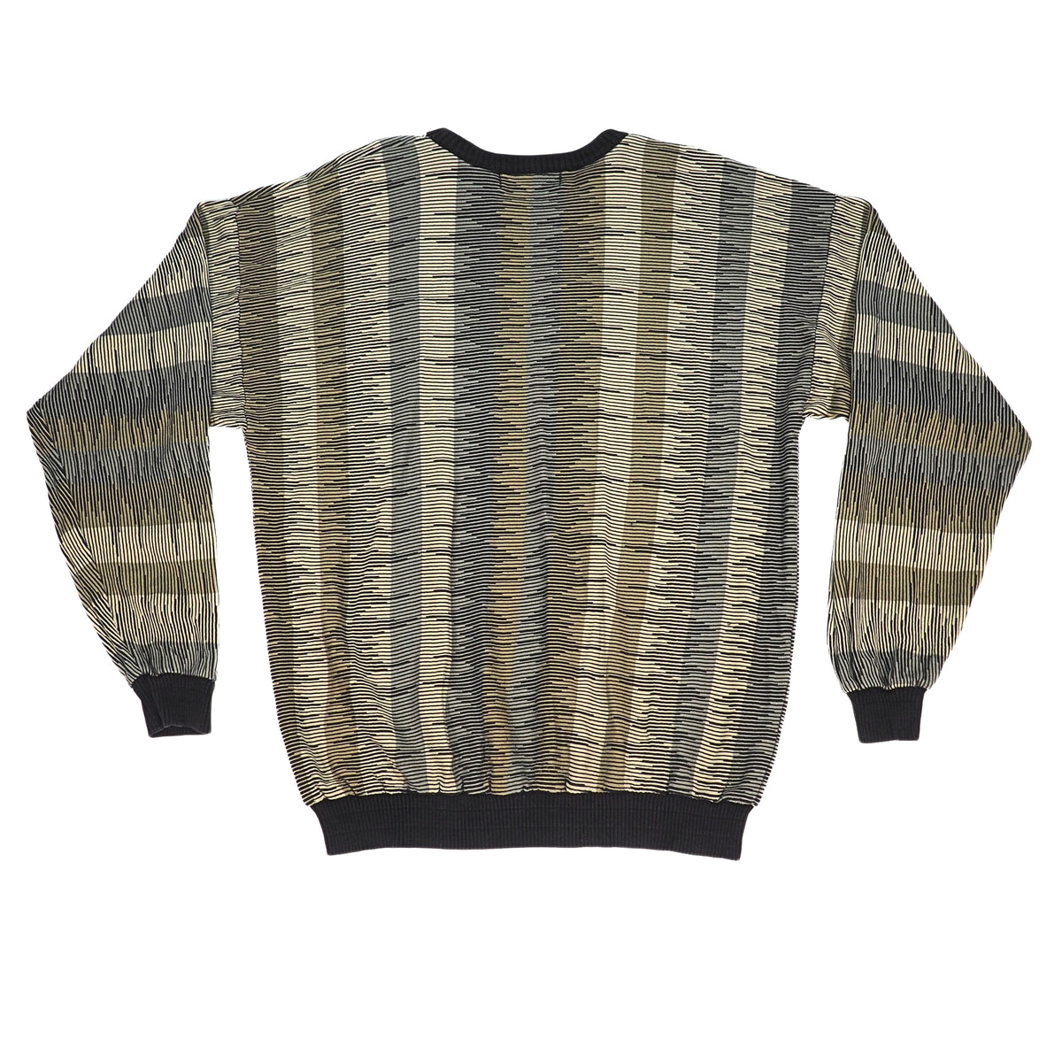 A long-sleeve crewneck sweater with a vertical striped ikat pattern in beige, brown, gray, and black, featuring solid black ribbed cuffs, hem, and collar, shown flat on a white background.