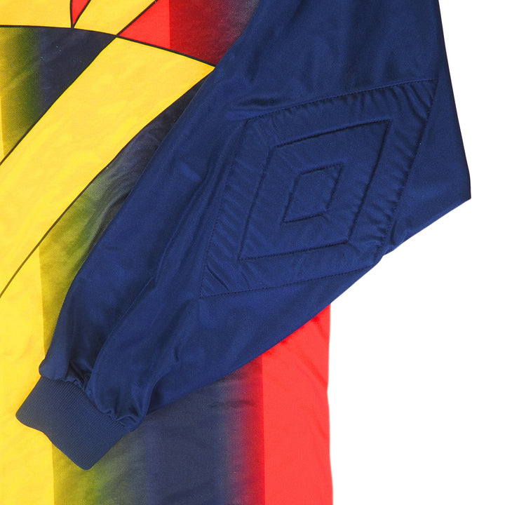 Detail of the padded sleeve of an umbro soccer goalkeeper jersey with colourful geometric pattern