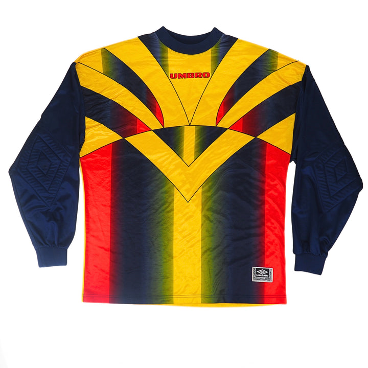 Front view of an umbro goalkeepers jersey with colourful geometric pattern