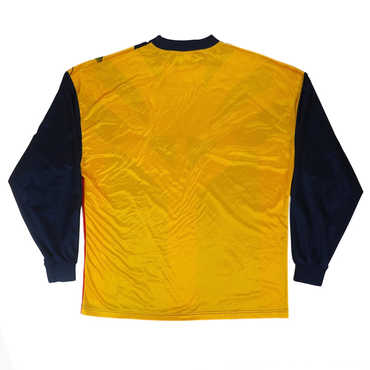 Back view of a yellow goalkeeper jersey with navy sleeves
