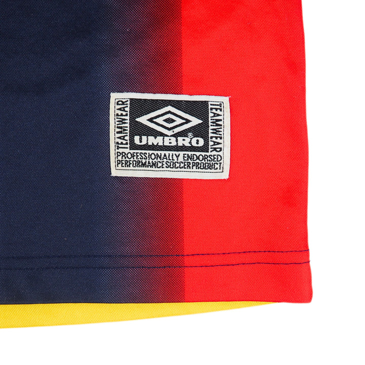 Close up of an Umbro Teamwear jock tag on the front of a soccer jersey