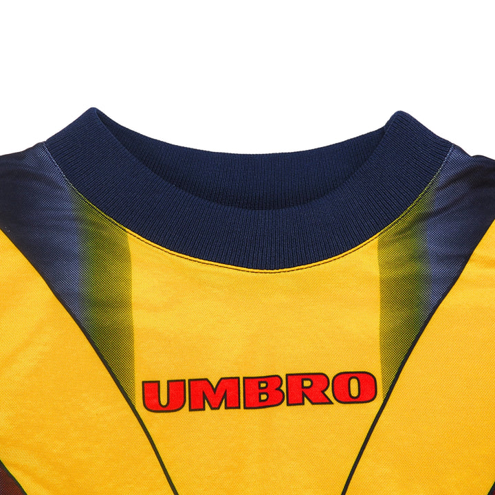 Detail of the collar of an umbro soccer goalie jersey with colourful geometric pattern