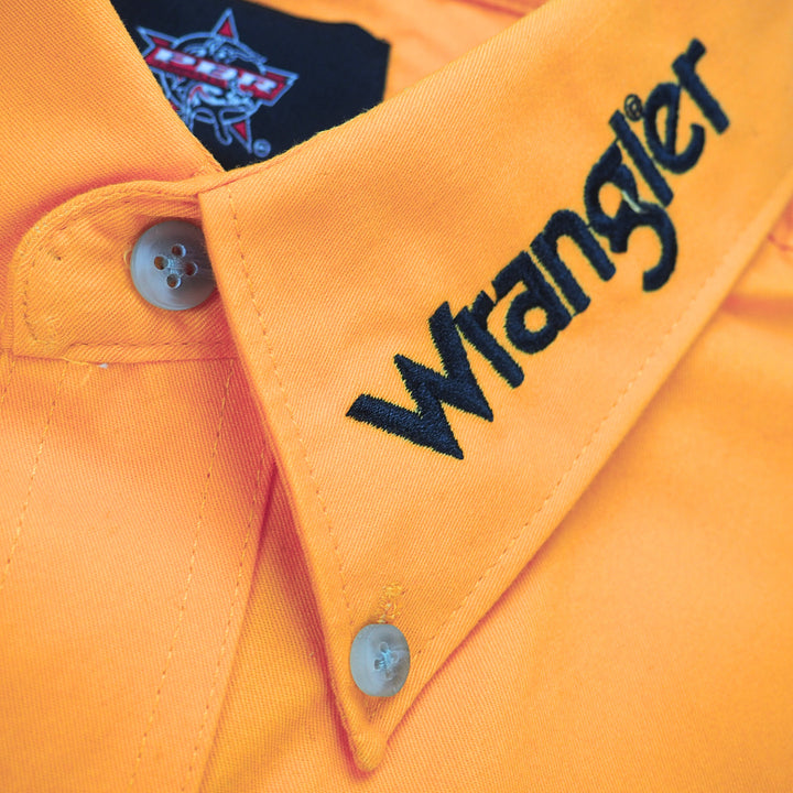 Close up of a button down shirt collar with Wrangler embroidery