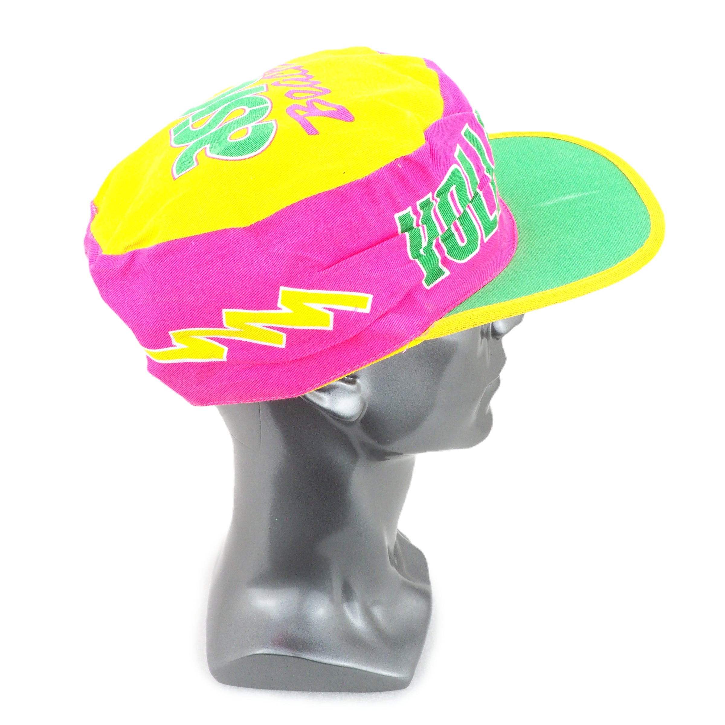 Colorful cap on a mannequin head against a white background