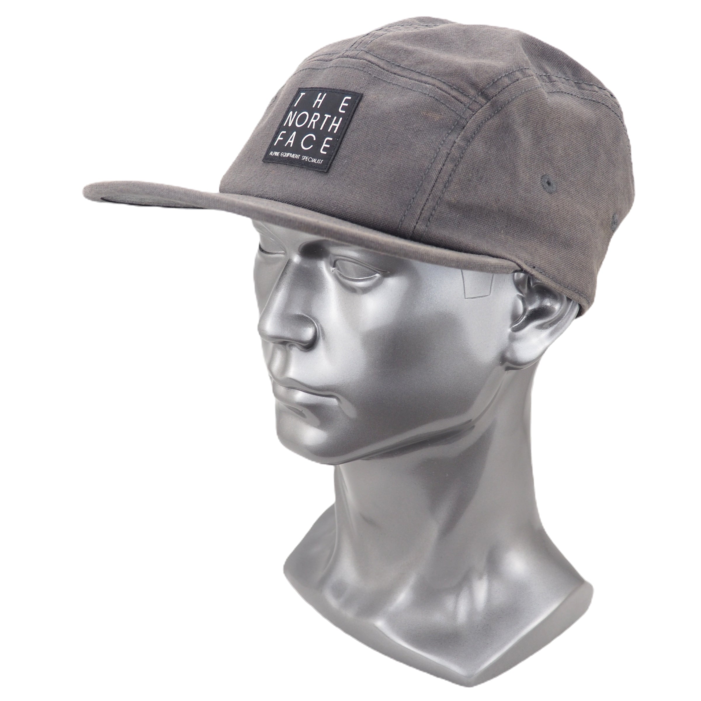 Gray cap with The North Face logo on a silver mannequin head against a white background