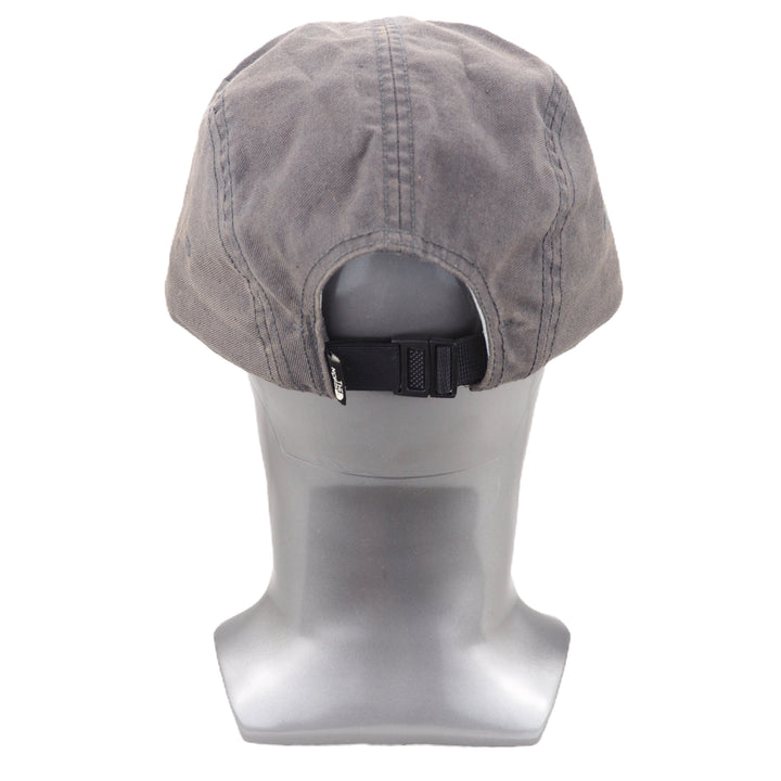 Gray cap on a mannequin head with a white background