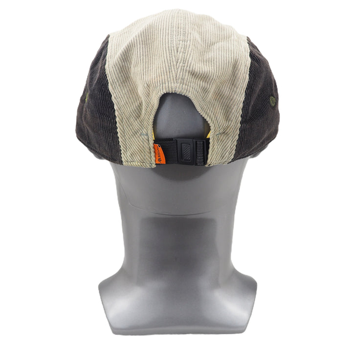 Corduroy cap with on a mannequin head against a white background