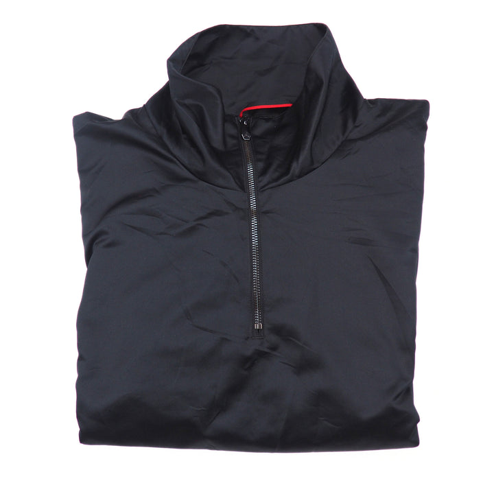 Folded black jacket with a zipper on a white background