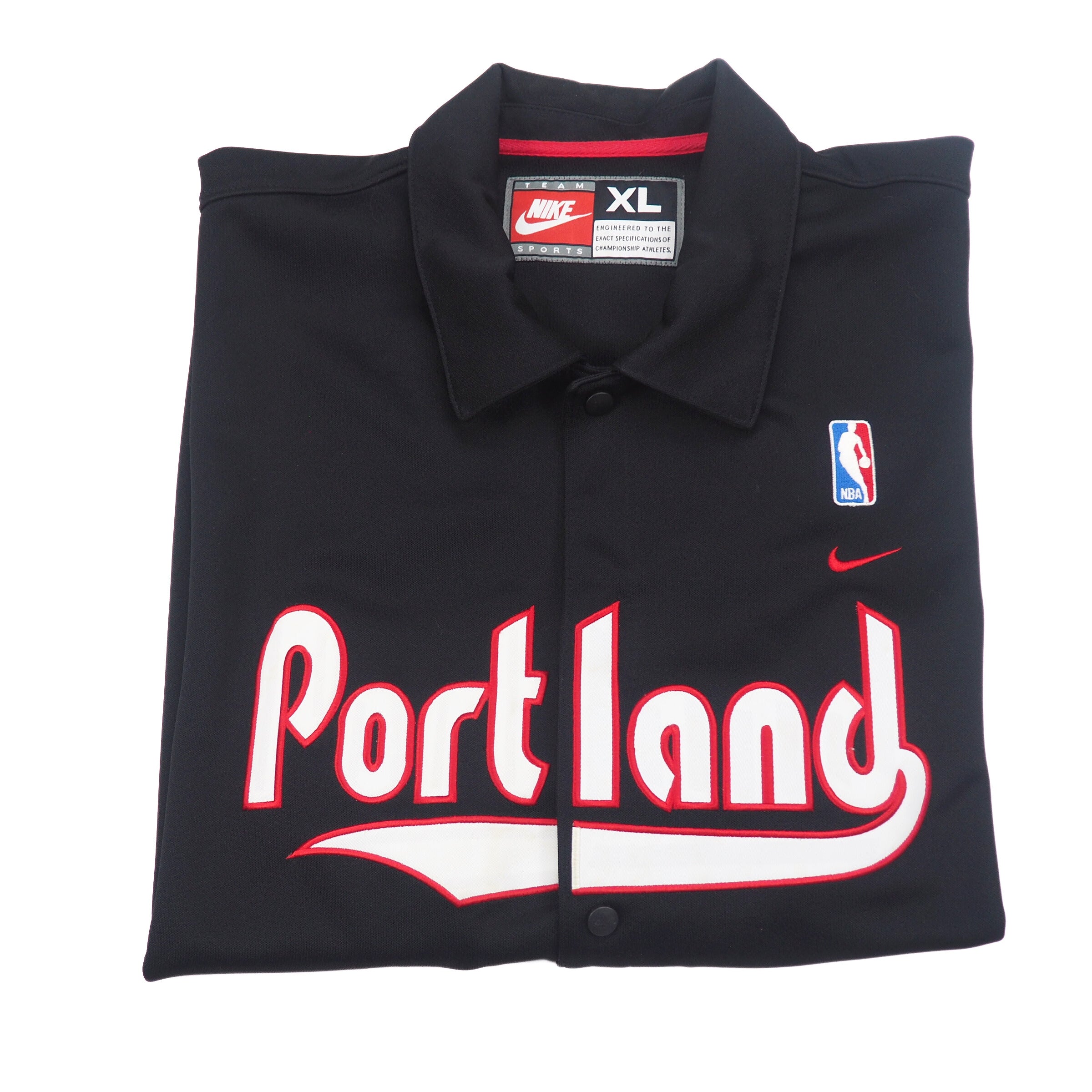 Black Portland jersey with Nike Team Sports label and NBA logo on a white background