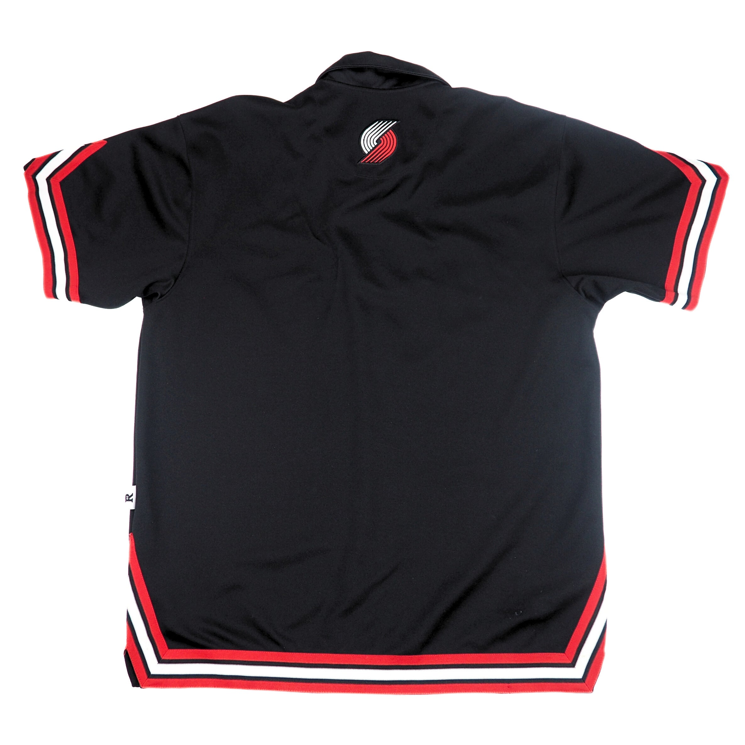 Black shirt with red and white accents on a white background
