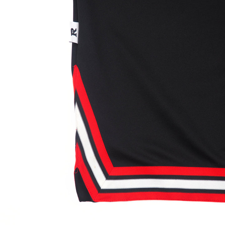 Black jacket with red and white trim on a white background