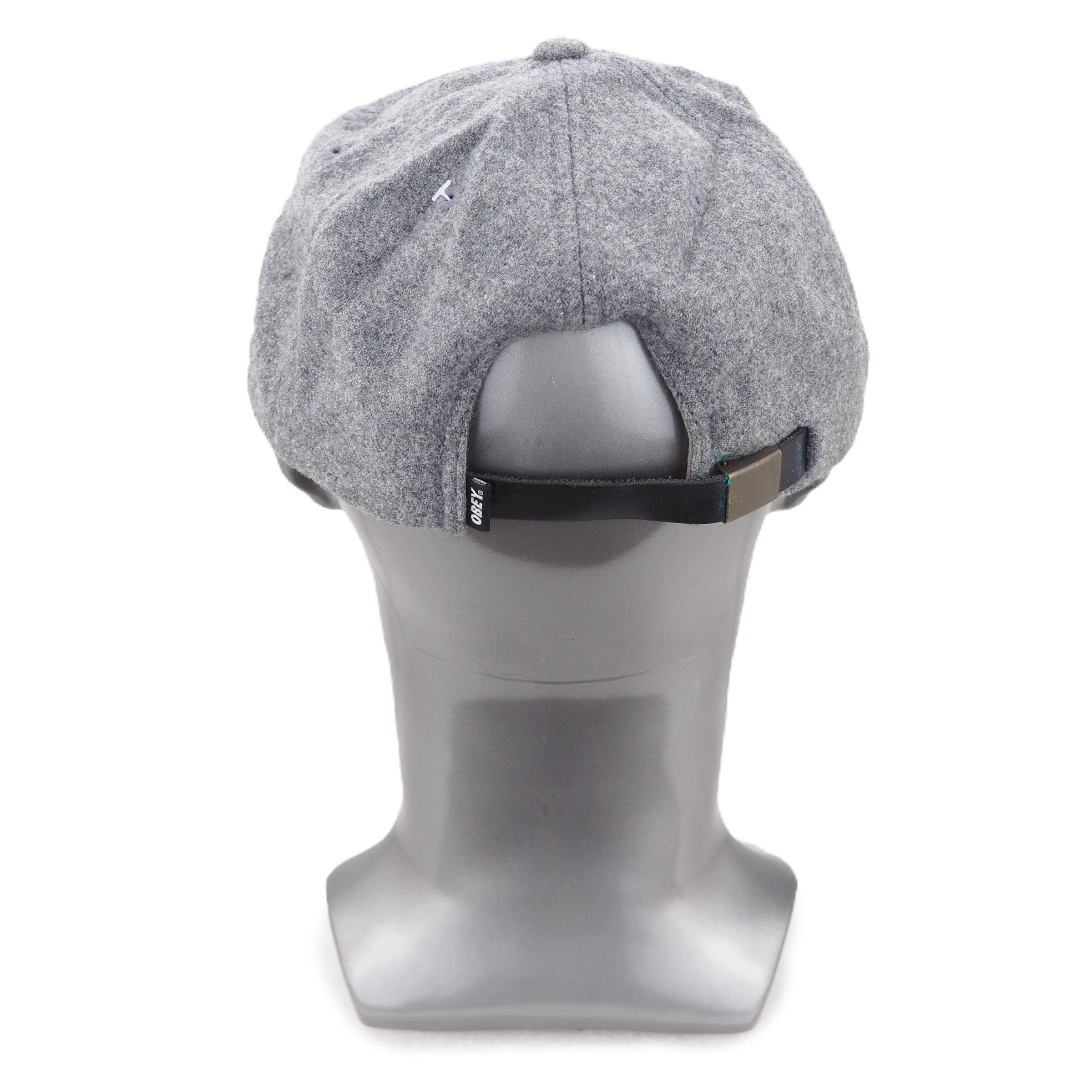 Gray cap on a mannequin head against a white background