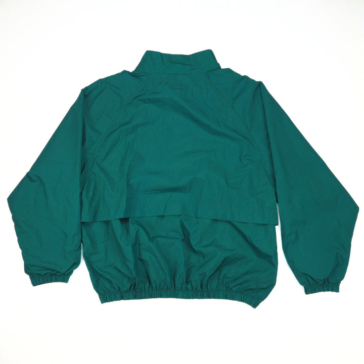 Green raincoat on a white background