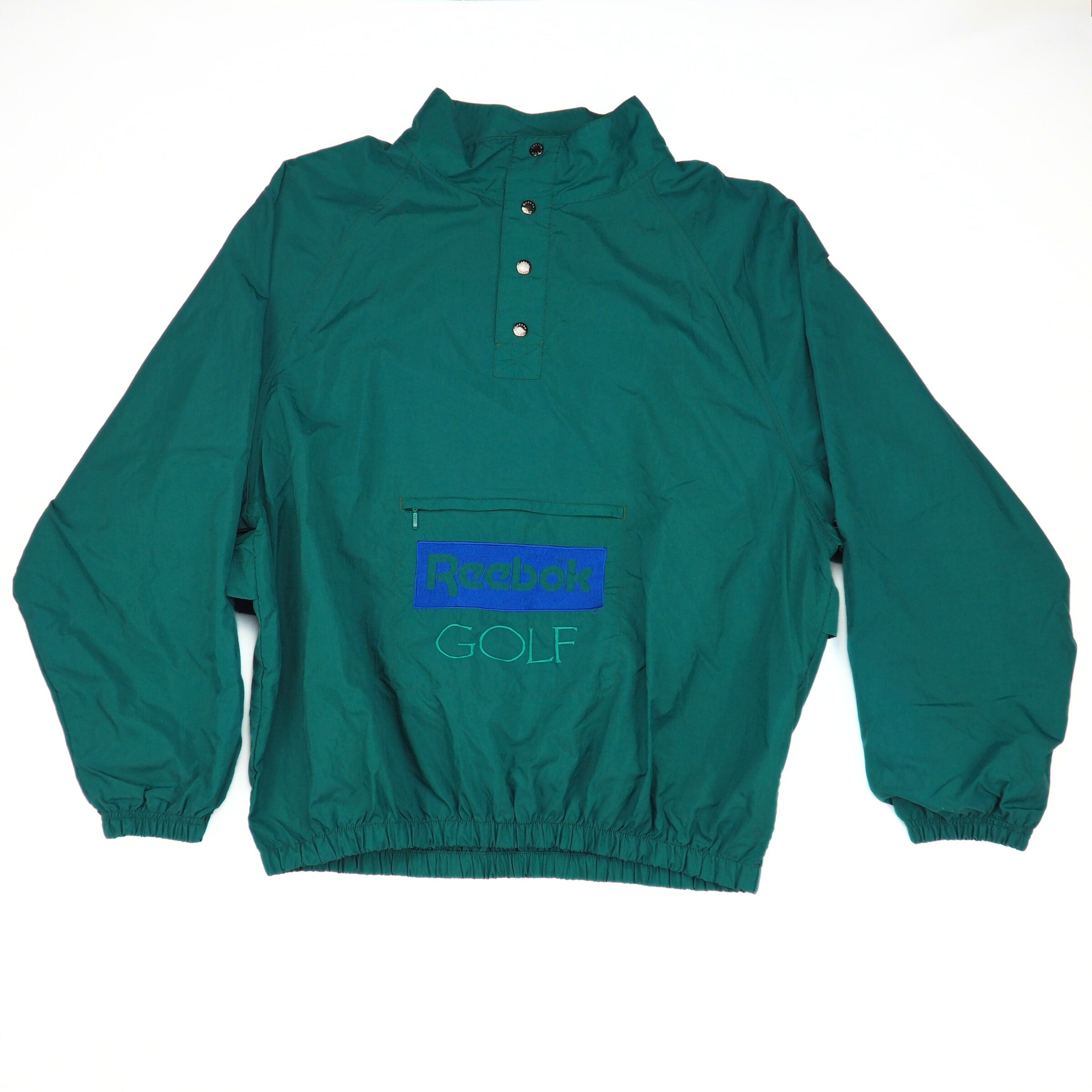 Green jacket with blue Reebok logo and green GOLF text on a white background